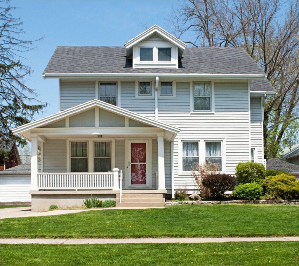Vinyl siding installation on a two-story New Jersey home